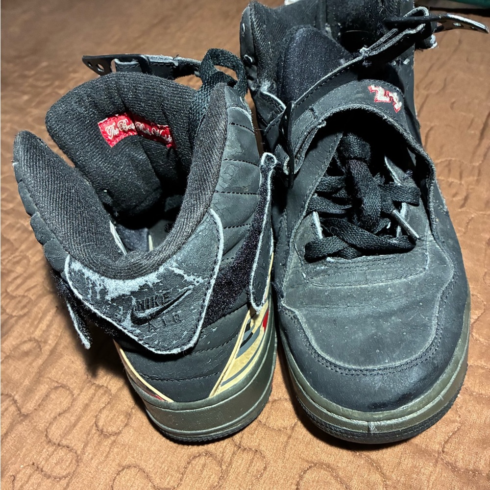 Jordan Black and Gold Sneakers